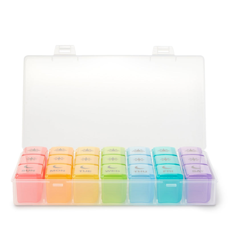 Set of colorful pill boxes in a clear plastic case on a white background