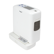 A white oxygen concentrator with a digital display screen and control buttons on top, sitting on a matching white base with a small control panel on the front.