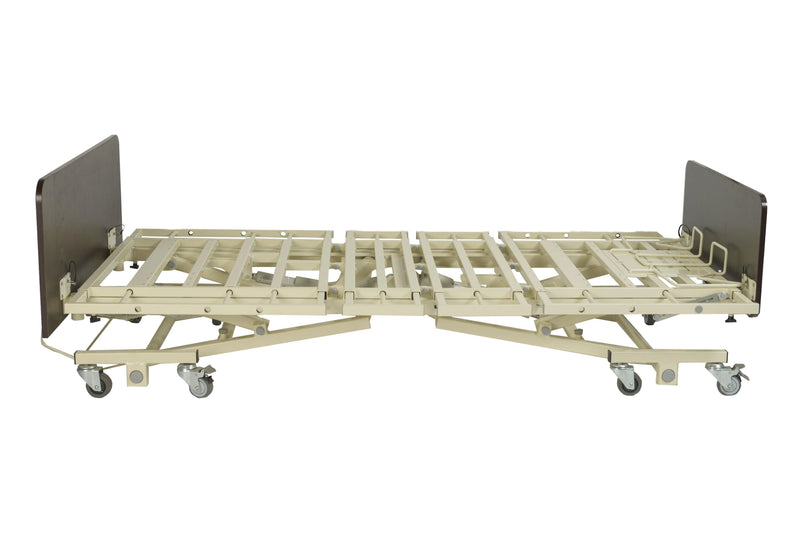 Beige hospital bed frame with metal side rails on a white background