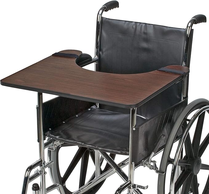 Wheelchair with attached wooden tray on a white background