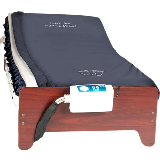 Medical mattress with wooden frame and control panel on a white background