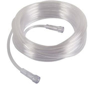 Coiled clear plastic tubing on a white background