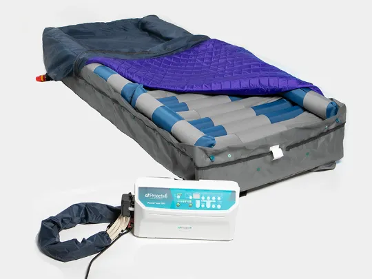 Inflatable mattress with blue cover and power adapter on a white background