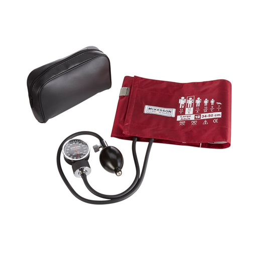 Blood pressure monitor with red cuff and black case on a white background