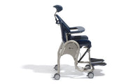 Nursing chair with wheels on a white background