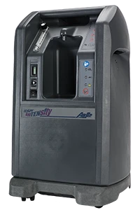 Gray oxygen concentrator with digital display on a black background