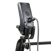 Close-up of a guitar capo with a white background