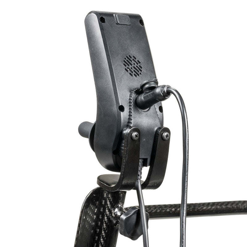 Close-up of a guitar capo with a white background