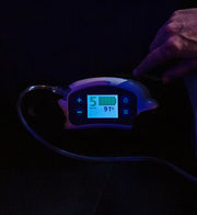 Digital device with a screen displaying battery level in the dark