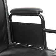 Close-up of a wheelchair with armrest and backrest.