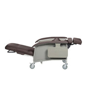 Medical examination table with wheels on a white background