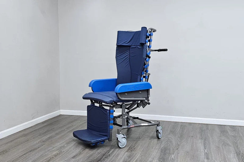 Blue and silver wheelchair in a room with gray walls and wooden floor.