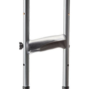 Metal crutch with a plastic handle on a white background