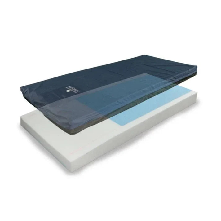 A mattress topper shown partially lifted over a white mattress base on a clean white background. The topper is dark navy blue with a translucent blue center panel and a small white logo near one corner.