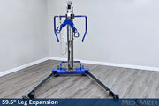 Mechanical leg expansion device on a wooden floor with a gray wall background