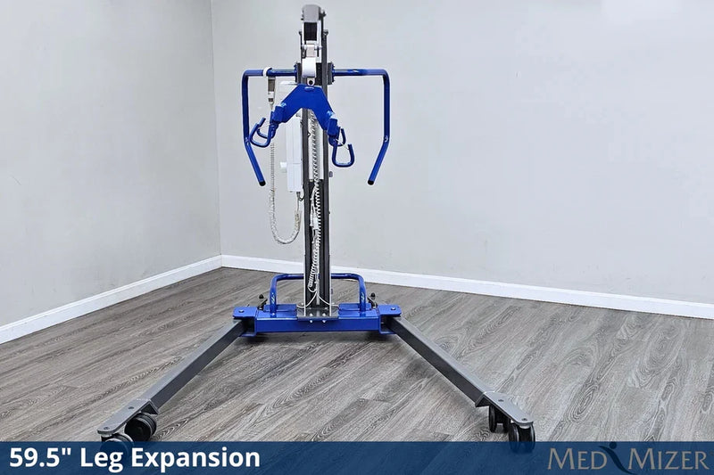 Mechanical leg expansion device on a wooden floor with a gray wall background