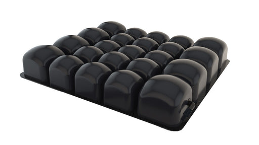 Black foam roller with multiple cylindrical segments on a white background