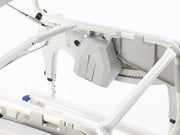 Close-up of a medical bed with control panel on a white background