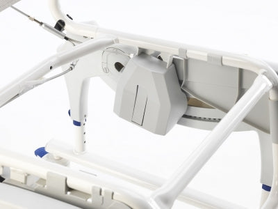 Close-up of a medical bed with control panel on a white background