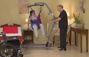 PL400 Patient Lift being used to move patient