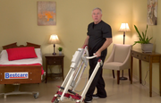 caregiver showing how easy it is to move the PL400EF