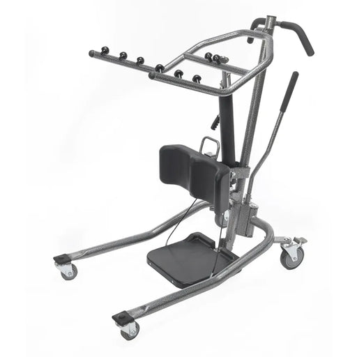 A motorized patient lift with a knee rest, footrest, and handlebars on a silver metal frame with caster wheels, shown against a plain white background.