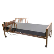 Hospital bed with metal frame and mattress on a white background