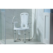 White shower commode chair with adjustable arms in a bathroom setting.