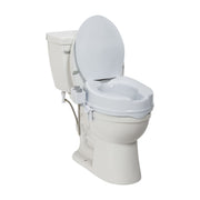 White toilet with a raised seat on a white background