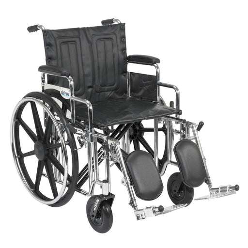 Black manual wheelchair with armrests and footrests on a white background