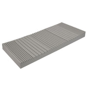 Rectangular gray mattress on a white background