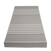 Rectangular mattress with a ribbed texture on a white background