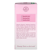 Pink box of Nature's Bounty Optimal Solutions with text on a white background