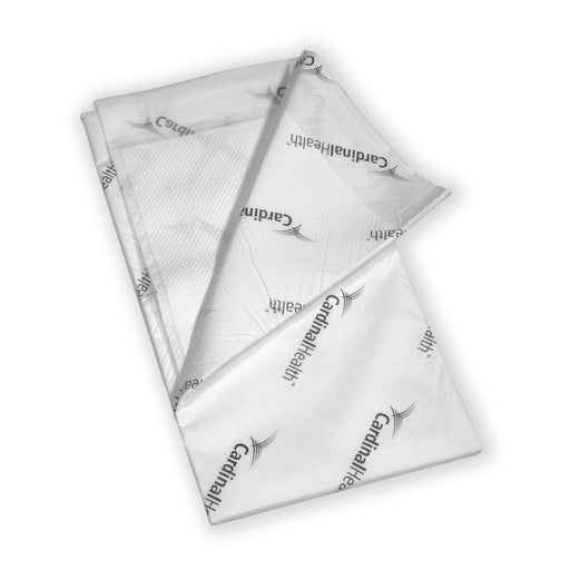 underpads stacked on a white background