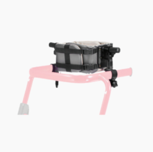 Small black device on pink stand against a white background