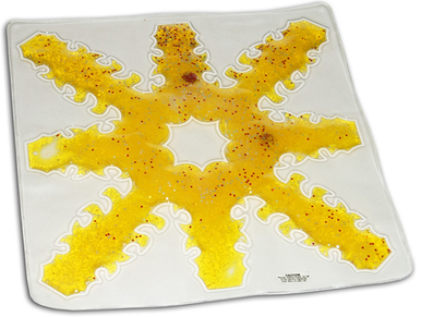 White plate with a yellow abstract design on a white background