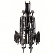 Folded black wheelchair on a white background