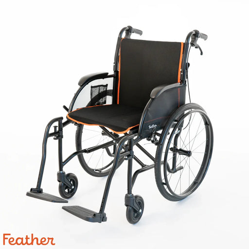 Black wheelchair with orange accents on a white background, featuring the brand 'Feather'.