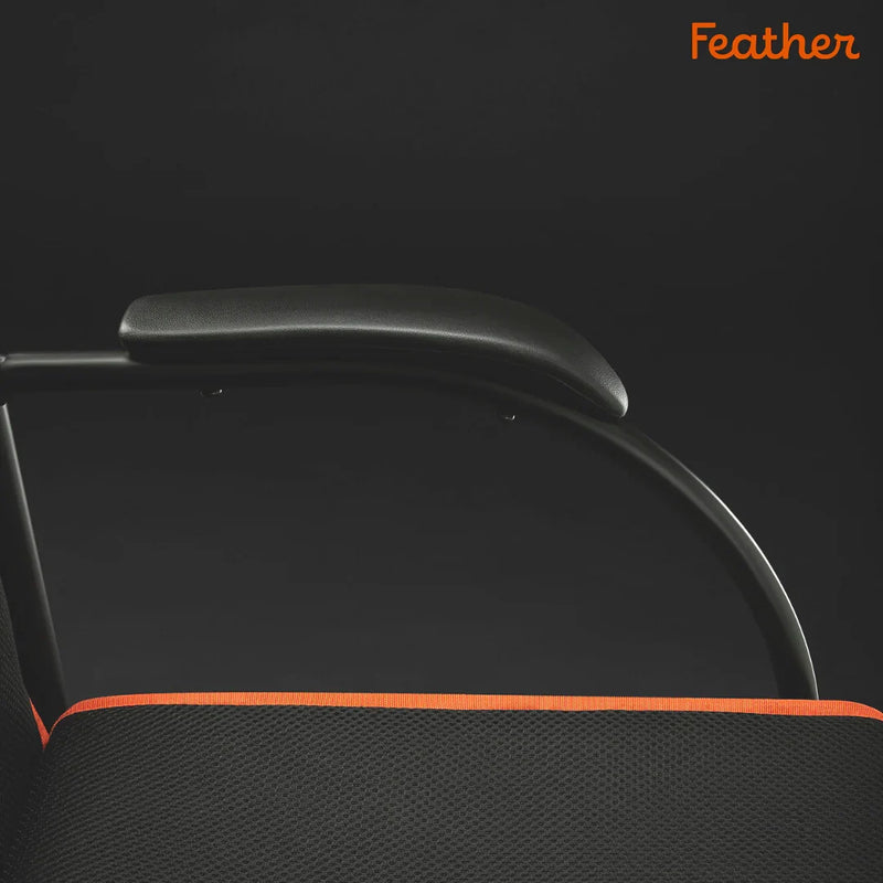 Black and orange chair with 'Feather' branding on a dark background