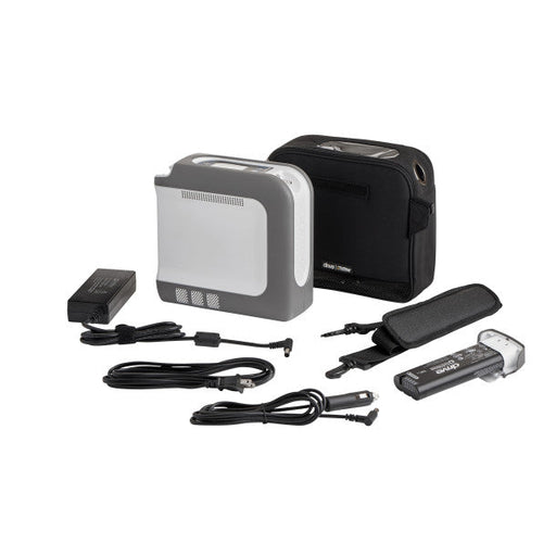 Collection of electronic devices and accessories on a white background