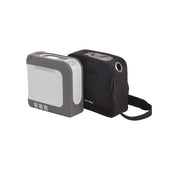 Two portable electronic devices, one gray and one black, on a white background.