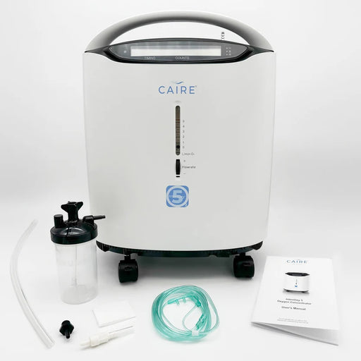 Caire oxygen concentrator with accessories on a white background