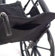 Close-up of a black wheelchair with a white background