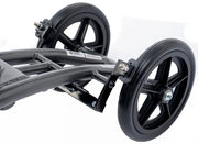 Close-up of a knee walker black wheels and frame on a white background