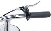 Close-up of a knee walker handlebar with black grips and chrome finish on a white background