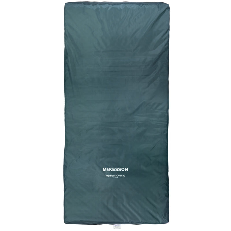 Green mattress overlay with McKesson branding on a white background