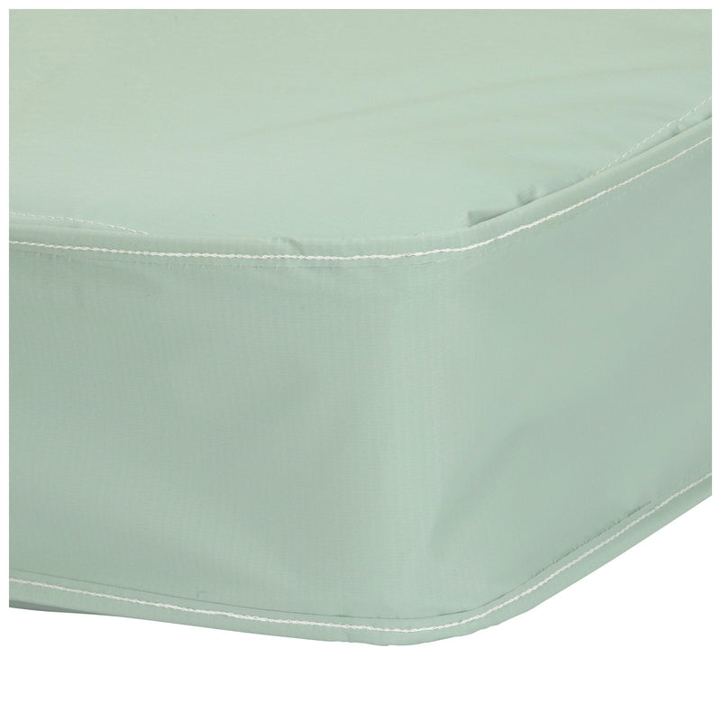 Light green fitted sheet corner on a white background