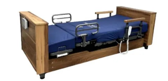 An electric hospital bed with a medium brown wooden frame, a blue mattress, and metal side rails, shown against a plain white background.