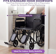 Wheelchair with elevating leg rests being used to navigate a standard home doorway.