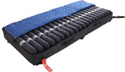 Mattress cover with exposed bladders
